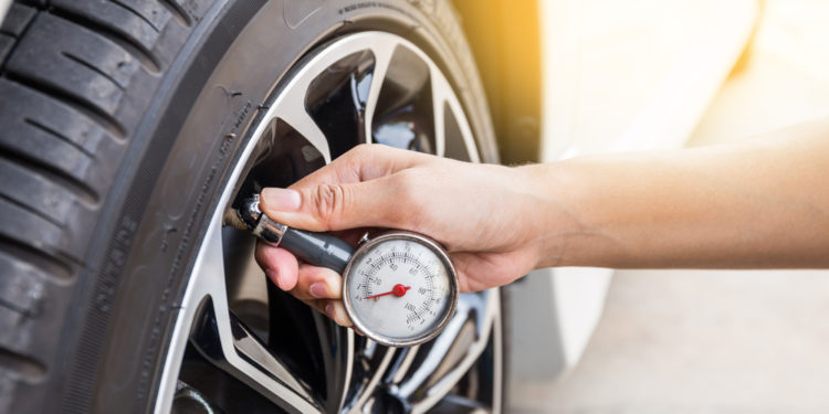 When should I check my tire pressure for regular maintenance?